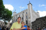 Couple dwarfed by White Tower