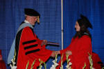 Andrea Accepts her Ed. M.